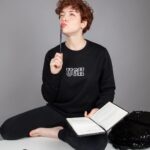 Daniel Howell Instagram - back to class with sass ugh crop sweater / notebook / sarcastic stationery / sequin bag 📝 now on shop.danielhowell.com ✨