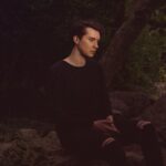 Daniel Howell Instagram - do you ever just sit on a rock striking a very natural pose clearly having deep thoughts about the book you are writing #candid #relatable #pointedfingers 📷 @sarahmlee47 (actually beautiful photo very talented thank you)