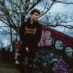 Daniel Howell Instagram - DOOMED MERCH HAS FINALLY DROPPED ONLINE - PREP FOR THE RAPTURE IN THESE BLACK ROBES AND MISC STYLISH ACCESSORIES 🌍 shop.danielhowell.com 🇺🇸 us.shop.danielhowell.com 🦘 au.shop.danielhowell.com 🇪🇺 eu.shop.danielhowell.com photography by @thomaslislebrooker