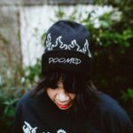 Daniel Howell Instagram - DOOMED MERCH HAS FINALLY DROPPED ONLINE - PREP FOR THE RAPTURE IN THESE BLACK ROBES AND MISC STYLISH ACCESSORIES 🌍 shop.danielhowell.com 🇺🇸 us.shop.danielhowell.com 🦘 au.shop.danielhowell.com 🇪🇺 eu.shop.danielhowell.com photography by @thomaslislebrooker