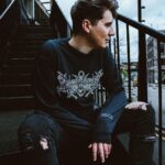 Daniel Howell Instagram - DOOMED MERCH HAS FINALLY DROPPED ONLINE - PREP FOR THE RAPTURE IN THESE BLACK ROBES AND MISC STYLISH ACCESSORIES 🌍 shop.danielhowell.com 🇺🇸 us.shop.danielhowell.com 🦘 au.shop.danielhowell.com 🇪🇺 eu.shop.danielhowell.com photography by @thomaslislebrooker