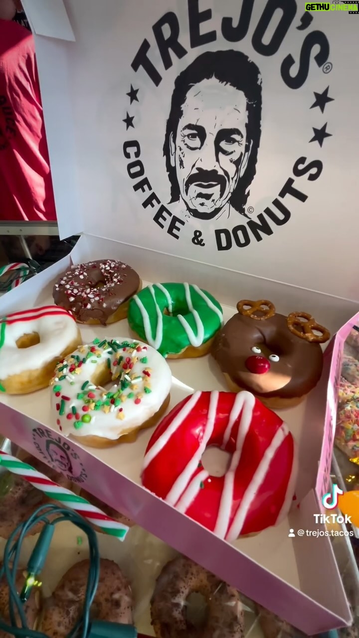 Danny Trejo Instagram - Deck the halls with Trejo’s Holiday Donuts! 🍩 🎁🎄 🦌Rudolph The Rednose Reindeer Chocolate abuelita with candied eyes, m&m nose and pretzel antlers 🎄Ornament Filled donut with spiced apple jam filling, buttermilk glaze and design 🎅Candy Cane Chocolate abuelita glaze with candy cane sugar glaze 🎁Holiday Gift Buttermilk glaze with buttermilk drizzle 🤶Christmas Cumpleanos Buttermilk glaze with Christmas sprinkles 👼Merry & Bright Red/Green Buttermilk glaze Open daily 7AM-4PM 📍6785 Santa Monica Blvd, Los Angeles #trejostacos #trejosdonuts #trejoscantina #trejoscerveza #trejosdonutsandcoffee #coffeeshop #losangeles #donuts #dannytrejo #breakfast #bakers #donutsandcoffee Trejo's Coffee & Donuts