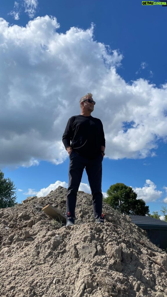 Dave Coulier Instagram - I moved this big pile of dirt and cleaned the build site…getting ready for a huge crane to drop the pool in to the foundation. Stay tuned. #coolerbuild #homebuilder #diy