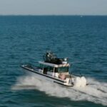 Dave Coulier Instagram - 256 miles to Mackinac Island. Many stops along the route. Happy tales and happy tails. #captaincooler #greatoutdoors #boatlife #dogsofinstagram Lake Huron, Mi