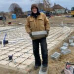 Dave Coulier Instagram - Busy day with our home build project. Concrete floors being poured and the first wave of Norway Spruce trees being planted. I also met on site with the gas company and window manufacturer. It’s cold and windy, so I built a fire for the crew. I need a nap! #homebuild #diy #coolerbuild #imagesbymelissacoulier