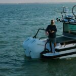 Dave Coulier Instagram - The simplest things in life bring the most joy. Exploring with our dogs, a bike ride, a swim, and a sunset. #captaincooler #greatoutdoors #boatlife #dogsofinstagram Lake Huron, Mi
