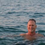 Dave Coulier Instagram - The simplest things in life bring the most joy. Exploring with our dogs, a bike ride, a swim, and a sunset. #captaincooler #greatoutdoors #boatlife #dogsofinstagram Lake Huron, Mi