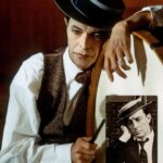 David Bowie Instagram - BOWIE’S BUSTER KEATON TRIBUTES “He’s Chameleon, Comedian, Corinthian and Caricature…” The first image here is another fine Steve Schapiro portrait from 1975. As you can see, David is pictured with Rudi Blesh‘s biography of Buster Keaton. Schapiro remembers how David was impressed with the photographer’s connection to Keaton: “From the moment Bowie arrived, we seemed to hit it off. Incredibly intelligent, calm, and filled with ideas, he talked a lot about Alistair Crowley whose esoteric writings he was heavily into at the time. When David heard that I had photographed Buster Keaton, one of his greatest heroes, we instantly became friends.” Bowie even used a full-page 1964 Schapiro shot of Keaton in New York inside the 1976 Isolar Tour programme. (2nd image) Bowie references Keaton in at least a couple of his videos. In the 1977 Stanley Dorfman-directed Be My Wife promo, he performs against a bleached-out background in this heartfelt plea for marital union and somehow manages to appear nonchalant and anguished at the same time. Apparently, Bowie’s make-up and mannerisms in the video were a nod to Buster himself. (3rd image) The Keaton look was reprised more obviously and to wonderful effect throughout the Miracle Goodnight video in 1993. (4th image) A couple more images may or may not have been as a result of David watching Keaton’s movies. Perhaps the links are a little tenuous, but here they are anyway. The 5th image is Sukita’s famous shot from 1973 wherein Bowie mirrors Keaton’s pose in the film The High Sign. (6th image) The 7th slide is the 1971 edition of the KEATON paperback that Bowie is holding in the first image and the still of Keaton as a sailor is from the film The Navigator. Finally, the last picture by @blamsnap is from the 2000 BowieNet Roseland concert when Bowie dressed nautically, Sailor being his chatroom nickname. KEATON is a book that David was clearly fond of, but it’s another that didn’t make it into BOWIE’S TOP 100 BOOKS - THE COMPLETE LIST: https://www.davidbowie.com/blog/2013/10/1/bowies-top-100-books-the-complete-list (Linktree in bio) #BowieBookLover #BowieSchapiro #BowieKeaton