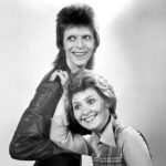 David Bowie Instagram – LULU’S MAN WHO SOLD THE WORLD IS FIFTY TODAY

“He said I was his friend…”

Fifty years ago today on Friday 11th January 1974, a 25-year-old Lulu launched the first of a few career resurrections in the shape of the Bowie-penned 45, The Man Who Sold The World/Watch That Man.

Produced and arranged by David Bowie and Mick Ronson the track reached #3 on the official UK singles chart, Lulu’s first top ten hit for five years.

It’s a superb record with a cracking arrangement quite different to the original Bowie track first recorded for the album of the same name in 1970.

Bowie provided backing vocals and a wonderful sax hook, while Ronno plays a solid riff throughout, all new to Lulu’s version which was recorded in France during the Pin Ups sessions.

The unlikely coupling created lots of press around the release, the Daily Mirror article in our montage being just one such item.

Apparently, David was more than a bit partial to the Lulu version himself, this from the Moonage Daydream book: 

“Lulu is such a bright, funny and talented little thing. When I first heard her version of ‘Shout’ I was initially gobsmacked that anybody British had the nerve to cover that Isley Brothers classic. Then I realised that she had actually done a great job with it. How the idea came up for having her do a version of ‘Man Who Sold The World’ I have no clue, but I’m so glad we did it. I used the Pin Ups line-up to back her, including Ronson and drummer Aynsley Dunbar, and played the sax section on overdubs. I still have a very soft spot for that version, though to have the same song covered by both Lulu and Nirvana still bemuses me to this day.”

Lulu went on to record a couple more songs with David that ended up on his own Young Americans album after he decided to keep them for himself…but that’s another story.

Check out Lulu singing The Man Who Sold The World here on YouTube: http://smarturl.it/LuluTMWSTW (Linktree in bio)

📸 Kent Gavin

#BowieLulu50th #Bowie1974