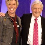 David Bowie Instagram – 20 YEARS AGO TONIGHT BOWIE ON PARKINSON

“Pictures on my hard drive…”

Twenty years ago this evening, The Parkinson Show featured Michael Parkinson in conversation with David Bowie, Victoria Beckham and Clive James.

Rather than us rattle on about how good it was, you can still view the full show over on the BBC iPlayer: https://bbc.in/47uBFZN (See Linktree in bio)

Aside from the BBC’s own image of DB and Parky, David is pictured here during performances of Ziggy Stardust and The Loneliest Guy and while rehearsing for the show, via the lens of @blamsnap. 

#BowieParkinson #BowieBBC