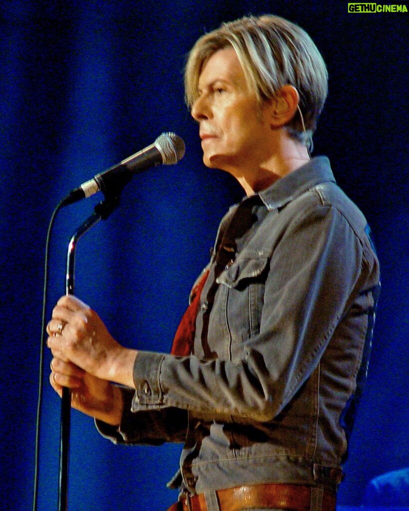 David Bowie Instagram - 20 YEARS AGO TONIGHT BOWIE ON PARKINSON “Pictures on my hard drive...” Twenty years ago this evening, The Parkinson Show featured Michael Parkinson in conversation with David Bowie, Victoria Beckham and Clive James. Rather than us rattle on about how good it was, you can still view the full show over on the BBC iPlayer: https://bbc.in/47uBFZN (See Linktree in bio) Aside from the BBC’s own image of DB and Parky, David is pictured here during performances of Ziggy Stardust and The Loneliest Guy and while rehearsing for the show, via the lens of @blamsnap. #BowieParkinson #BowieBBC
