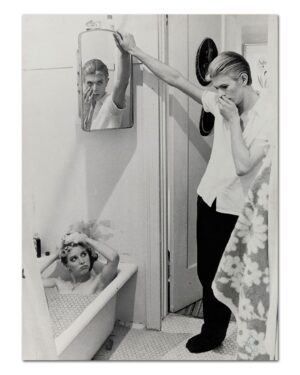 David Bowie Instagram - Please forgive the graininess of our latest Bowie Reflection. It’s an enlargement of TJ Newton (Bowie) on the set of The Man Who Fell To Earth, taken by David James. 

Here’s the caption from the reverse of the uncropped photo: “Mary-Lou (CANDY CLARK) tries to break down formal barriers between herself and Thomas Jerome Newton (DAVID BOWIE) when she invites him into her bathroom.”

The second image is of Bowie’s original artwork (see signature bottom right), a collage he created utilising two other stills from the same scene.

If you’re unfamiliar with this piece, it first appeared as a full-page in the 1976 ISOLAR tour programme and it was also an exhibit at the David Bowie Is V&A exhibition. (See last image)

Look closely at Bowie’s reflection and the bubbles in the bath. A bit of pre-Photoshop scalpel work by Bowie.

Thankfully, his replacement of the bubbles with Linoleum keeps us on the right side of social platform censors. The original image of Mary Lou was a little more revealing. 

#BowieReflections