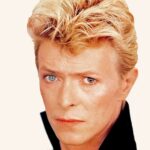 David Bowie Instagram - DAVID BOWIE VIDEO EP IS FORTY “You could look into my eyes...” Around about now, forty years ago, the David Bowie Video EP was released on VHS along with a laser disc in the US and Japan. Containing the promo videos from the Let's Dance album; Let’s Dance, China Girl and Modern Love, this release was the only source of the uncensored China Girl video. To the YouTube generation this probably doesn’t seem a particularly big deal, but forty years ago it was. And if it took your fancy, you could even dwell on a naked David Bowie’s posterior: https://www.youtube.com/watch?v=iK6gAbZdhDc (Linktree in bio) If you’re wondering about the seemingly gratuitous use of a Tony McGee Bowie portrait, a mono image from this session was colourised for the US advert. 📸 Tony McGee #BowieLetsDanceVideoEP #BowieTonyMcGee #BowieLetsDance #Bowie1983