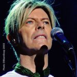 David Bowie Instagram – A REALITY TOUR KICKS OFF 20 YEARS AGO TONIGHT

“Welcome to Reality…”

The first leg of David Bowie’s A Reality Tour proper commenced twenty years ago today on 7th October 2003 at the Forum Copenhagen in Denmark.

A Reality Tour played at venues worldwide into the summer of 2004, and at well over 100 shows it became the longest of Bowie’s career.

Did you attend any of the concerts? If so, what are your memories of the tour?

The images here were taken by @BlamSnap at rehearsals in Brussels in Belgium a few days earlier, while the Reality album was still at its peak position of #3 on the UK album chart. 

Speaking of Reality, Jason Draper celebrated its 20th anniversary with this piece over on ThisIsDig!: https://www.thisisdig.com/feature/reality-david-bowie-album-story/ (Linktree in bio)

FOOTNOTE: The chap helping David with his jacket in the second image is all round good egg, @jimmyking3333. 

#BowieARealityTour