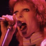 David Bowie Instagram – MOONAGE DAYDREAM AT HAMMERSMITH 4K UPGRADE

“I’m an alligator…”

Ahead of next week’s release, the sublime Moonage Daydream is the latest upgraded video to be uploaded to YouTube: https://youtu.be/6pXoQ6iYO1w

Those already familiar will possibly agree that this performance is among Mick Ronson’s crowning moments. What a solo!

Pre-order Ziggy Stardust and the Spiders From Mars: The Motion Picture here: https://lnk.to/Ziggy50 

(Linktree in bio)

#Ziggy50 #BowieHammersmithOdeon50th #ZiggyMoPi