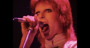 David Bowie Instagram - MOONAGE DAYDREAM AT HAMMERSMITH 4K UPGRADE

“I’m an alligator...”

Ahead of next week’s release, the sublime Moonage Daydream is the latest upgraded video to be uploaded to YouTube: https://youtu.be/6pXoQ6iYO1w

Those already familiar will possibly agree that this performance is among Mick Ronson’s crowning moments. What a solo!

Pre-order Ziggy Stardust and the Spiders From Mars: The Motion Picture here: https://lnk.to/Ziggy50 

(Linktree in bio)

#Ziggy50 #BowieHammersmithOdeon50th #ZiggyMoPi