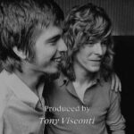 David Bowie Instagram – PRODUCED BY TONY VISCONTI CD BOX DUE OCTOBER

“They can’t get enough of it all, Listen…”

A 77-track 4-CD box set called Produced By Tony Visconti is released on 20th October and is available to pre-order here now, including a strictly limited edition signed version: http://tonyvisconti.lnk.to/ProducedBy (Linktree in bio)

The set is a career-spanning look at the many artists Tony worked with across a period of more than fifty years.

It’s been said that Tony Visconti ‘probably produced one of your all-time favourite albums’. Now for the first time, Edsel is proud to present the first definitive retrospectives of the legendary Brooklyn-born record producer.

Naturally, one would expect David Bowie to be represented, and he is with the following 4 songs (one on each disc)…

Young Americans (2016 Remaster)
The Man Who Sold The World (2020 Mix) 
I Would Be Your Slave
Memory of a Free Festival (2019 Mix)

Of the set, Tony says, “This boxset covers five and a half decades of my efforts in the art of making iconic recordings. Some of it is familiar and some will have a eureka moment, ‘I didn’t know Visconti produced that one!’”

Grammy-winning creatives @barnbrookstudio have designed the artwork, the first two images we have posted are not their work, the third is. 

The second image of David in the studio was taken by Tony and is accompanied with a short excerpt of the text regarding I Would Be Your Slave. 

The 4CD set is housed in a deluxe 80-page casebound book, with previously unseen photographs, an introduction by Tony, extensive track-by-track liner notes by author and journalist Mark Paytress (including track-by-track commentaries by Tony), and tributes from a selection of featured artists.

The audio for the sets has been mastered by Phil Kinrade at AIR Mastering and personally approved by Tony. 

Produced By Tony Visconti is available in the following formats, though only the CD set contains Bowie tracks.

PRODUCED BY TONY VISCONTI (http://tonyvisconti.lnk.to/ProducedBy) (Linktree in bio)
DELUXE 4-CD 77-TRACK 7” BOXSET WITH 80 PAGE BOOK
STRICTLY LIMTED EDITION DELUXE 6-LP 60-TRACK BOXSET 60 PAGE BOOK
2-LP 14-TRACK WITH 12 PAGE BOOK 

#BowieVisconti