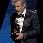 David Bowie Instagram - BRETT MORGEN ACCEPTS GRAMMY FOR BEST MUSIC FILM “Freak out in a Moonage Daydream...” Brett Morgen’s David Bowie documentary Moonage Daydream has won this year’s Grammy Award for Best Music Film, and Brett Morgen was there to accept it in person. “When I first started this project, I met with David Bowie’s executors,” Brett said during his speech. “Bill [Zysblat] said to me, 'David is not here to authorize this film, so it cannot be Bowie on Bowie. You have to embrace it. It’s going to be Morgen on Bowie.' And there are not a lot of people in this day and age who would hand over all of these archives and let me make an art project.” After thanking the executives as well as his wife and kids, Brett closed by thanking “David Bowie, the single greatest artist who’s walked the face of this earth.” Watch his acceptance speech here: https://youtu.be/gaWY2z_u44k?si=Hp_893nqQh68pLL3 (Linktree in bio) Moonage Daydream was up against stiff competition in the shape of the other nominees in the Best Music Film category, including How I'm Feeling Now (Lewis Capaldi), Live From Paris, The Big Steppers Tour (Kendrick Lamar), I Am Everything (Little Richard), and Dear Mama (Tupac Shakur). Congratulations to everyone involved in this remarkable work...particularly David Bowie! 📸 Mick Rock 📸 Masayoshi Sukita #66thGrammyAwards #Grammys2024 #BowieGrammyAwards #MoonageDaydreamFilm