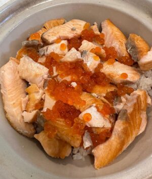 David Chang Instagram - Kids dinner: Roasted salmon with roe on rice. Only one son loved it.  The other son is in a serious committed relationship with boxed Mac & cheese. I have to break them up somehow.