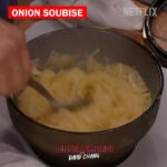 David Chang Instagram - WARNING: Onion Soubise will make you cry! First because you gotta cut up those onions and then AGAIN when you add it to David’s absolutely heavenly potato chip, fried egg, and caviar menu item from the #HighLow episode. Will you be trying this Onion Soubise recipe on your own potato chip and egg creation? Tag us to show us how yours turned out! Full recipes from #DinnerTimeLive’s High-Low Menu are available now via the link in bio!