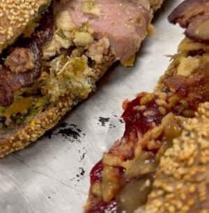 David Chang Instagram - The inaugural @nflonprime Black Friday game is in the books. Been working on this leftover sandwich for a few months…we finally got to unveil The Wedge Buster, presented to the mvps of game 

We worked on a special bread with @wholefoods head baker to be soft, yet sturdy enough to hold 16+ leftovers..have enough size so it doesn’t look small for an nfl player. Trying to incorporate flavors like jerk…which is one of @rsherman25 favorite foods and we got some boudin from @cochonbutchernola for @andrewwhitworth77…etc etc. had to put in some @momofukugoods hot honey too. The Wedge Buster is like a scrapbook of the TNF team. 

So happy that @cheetah & @cwilkins42 enjoyed the food 🙏