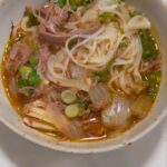 David Chang Instagram - Beef brisket soup, fish on rice, sort of a yukejang. I bought some frozen kimchi jeon from the package and they were not so good.