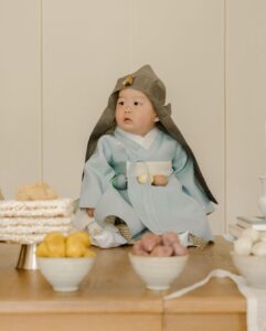David Chang Instagram - Gus’ 🇰🇷 돌 (dol). Happy first birthday baby king! ❤️ 돌잡이 = 🏹 🙏🏼 @graceseo 📸: @justinchung