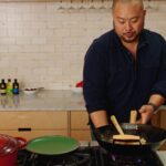 David Chang Instagram - Fried rice is the best breakfast…probably make this for breakfast more than anything else. Whatever is leftover in the fridge goes in - also used @momofukugoods soy, savory, and chili crunch. Watch the full video at the link in my bio.