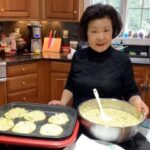 David Chang Instagram - I miss momma Chang…she’s the star of the first season of @uglydelicious. Here she was making her famous bin dae ttuk….Tomorrow at 7pm EST @netflix on their tik tok channel…is hosting a watch party of season 1 episode 3…the thanksgiving day episode. Come watch one of my favorite episodes. Link is in bio. ❤️, 👶👑