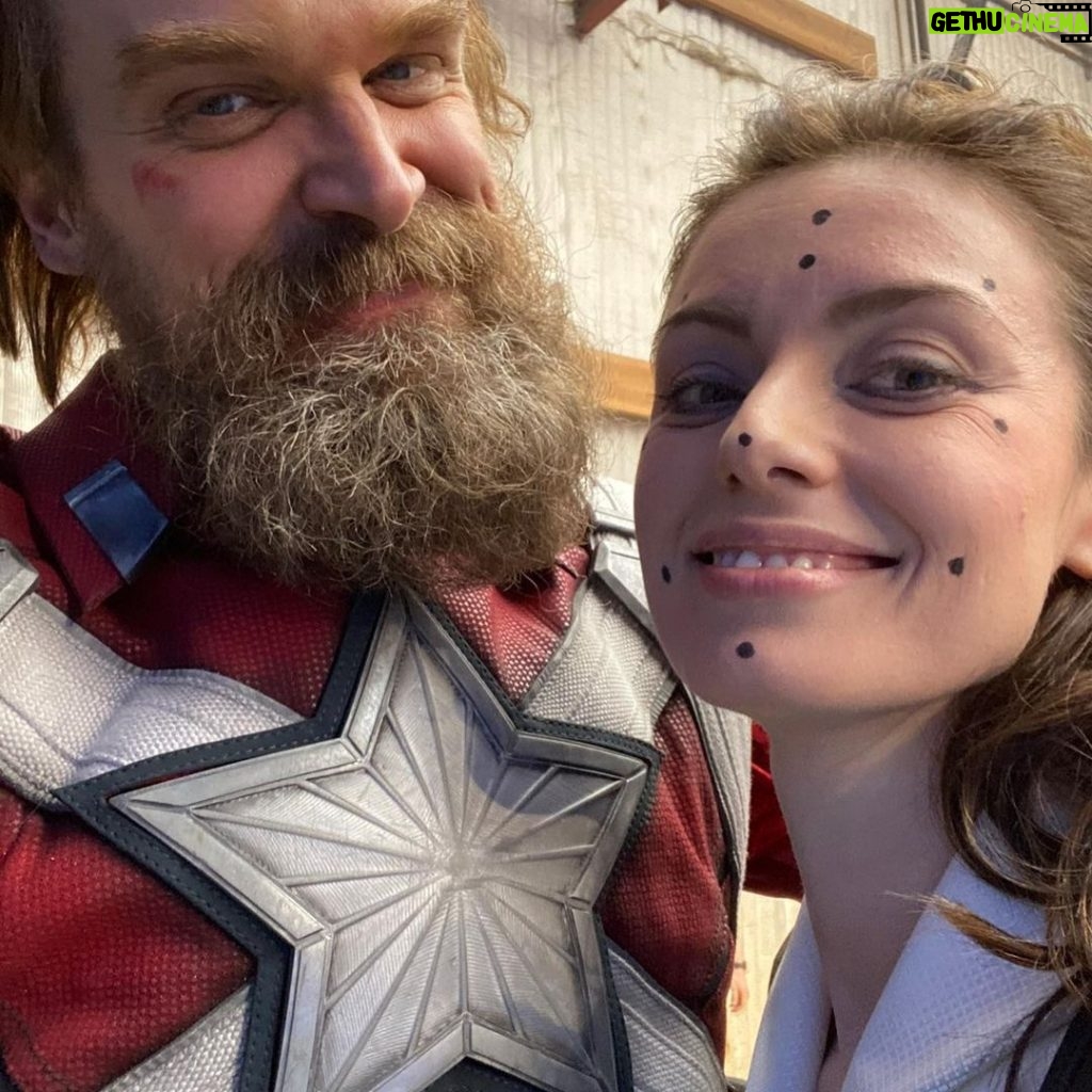 David Harbour Instagram - Thank you for all the @black.widow movie love. It was such an honor to work directly with THE Scarlett Johansson and Florence Pugh and of course in the second pic, my fave Rachel Weisz! So down to earth and sweet, kept saying we’re not the ‘real actresses’ obviously to make me feel less intimidated to be working with such international stars! Makeup department was clearly off their game tho, because they kept covering their faces with these black dots! Had something to do with being assassins I guess. All in all a weird wonderful 4 and a half months! #dadjokes #brandambassador