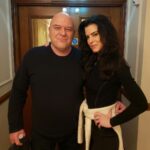 Dean Norris Instagram – Just wrapped another one. Tyler Perry’s 6888 with Kerry Washington, Susan Sarandon, Sam Waterston and Oprah. Here with my old friend, producer extraordinaire, the fiercely intelligent, absolute girl boss and obviously beautiful @keriselig 
Bye England 😔you treated us well