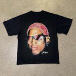 Dennis Rodman Instagram - ARE YOU READY? 🚦🏁 RODMAN APPAREL OUT NOW! LINK IN BIO! - Limited Quantities - 7.5 OZ Heavyweight Tee - Full Color Screen-Printed Graphic - Boxy Fit - Thick Collar - Vintage aesthetic - Ships within 48 hours of ordering