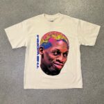 Dennis Rodman Instagram - ARE YOU READY? 🚦🏁 RODMAN APPAREL OUT NOW! LINK IN BIO! - Limited Quantities - 7.5 OZ Heavyweight Tee - Full Color Screen-Printed Graphic - Boxy Fit - Thick Collar - Vintage aesthetic - Ships within 48 hours of ordering