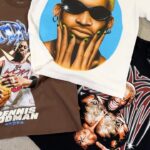 Dennis Rodman Instagram - AVAILABLE NOW: OUT OF THIS WORLD- DELIVERY 1👽💫 3 new designs and restocks of some favorites! Super limited quantities ! All of our tees are - Heavyweight - Oversized - Screen-printed - Made w/ premium materials - Ships fast and worldwide - Super limited quantities - Official Rodman brand This collection captures some of Dennis Rodman’s iconic moments that helped shape the world of sports, culture, and entertainment. 🛸🌎 Available now at RodmanApparel.com or Instagram shop‼️