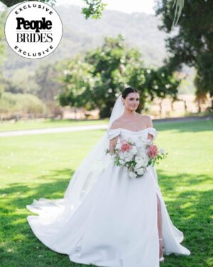 Derek Hough Instagram - "Regal redwoods" was the theme of @derekhough and @hayley.erbert's wedding in Carmel, California. From Hayley's custom Marchesa wedding gown and @inesdisanto reception dress to the opulent chandeliers and florals, see all the photos from their star-studded celebration at the link in bio. 
📷: @amyandstuart
📋: @simplytroy
💐: Jimmy Hartman of @inblumela
👗: @marchesafashion and @inesdisanto
💇‍♀️: @jill901
💄: @emmawillishmu
🪧: @katecozziegraphicarts
🎥: @whiteinrevery
📍: @santaluciapreserve
🍰: @kellygraycakes
💡: @signaturechandeliers
🍽️: @theonicollection