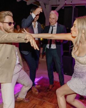 Derek Hough Instagram - Love ❤️ these two humans and so happy to celebrate with them on their big day! What makes these photos even better is looking at the reactions of people in the background 😂… ooo a flower 🌸 
📷: @christinamcneill