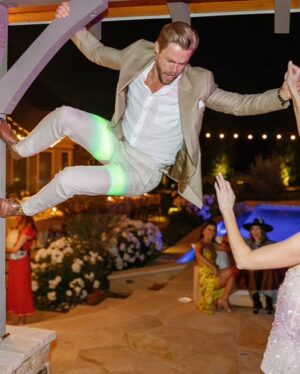 Derek Hough Instagram - Love ❤️ these two humans and so happy to celebrate with them on their big day! What makes these photos even better is looking at the reactions of people in the background 😂… ooo a flower 🌸 
📷: @christinamcneill