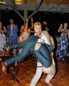 Derek Hough Instagram - Love ❤️ these two humans and so happy to celebrate with them on their big day! What makes these photos even better is looking at the reactions of people in the background 😂… ooo a flower 🌸 📷: @christinamcneill