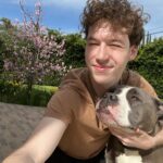 Devin Druid Instagram - The most heart-breaking Christmas post I ever hope to have. Just a few hours ago, I had to rush my boy to an emergency vet after he collapsed at my feet. My worst fears were realized and I was told my rescue furever friend of 9 years had passed, and he’s gone to roam the great doggy farm in the sky. Finn was first discovered in an abandoned house in Riverside with 40+ other dogs, back in 2016. The authorities were eventually called because of the smell. Finn clocked in at 22 pounds, had his vertebrate exposed from improper tail docking, and he was emaciated. They were left to starve to death and eat each other and their feces. Sick people treat our loving dogs this way. Thankfully various rescues teamed up to do such lifesaving work for these dogs. @wagsandwalks ended up rescuing my Finn, and nursing him back to health with the help of his amazing foster family. This is when I was introduced to the big head himself, and immediately fell in love. He was so gentle and thoughtful; likely a defense mechanism from his life of abuse. But overcoming that, it because his default and what we unlocked beyond that was an abundance of love, trust and absolute loyalty. From that day on, Finn’s favorite place to be was at my side. I know we will be reunited one day, my friend. Thank you for being MY dog, and my best friend. I am so lucky you chose me and I had so many years of love and joy (and eating) with you. I will love you forever Finn, and I will miss you for all of my life. Rest in peace my sweet man.