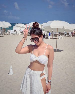 Dhanashree Verma Instagram - Living the Miami life 🌊🌮🤍

Swimwear: @adderyfashionhouse