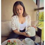 Dhanashree Verma Instagram – When chatur chahal willingly clicks my pictures at the breaky table 🫡📸💕