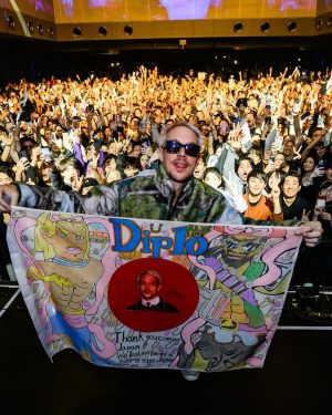 Diplo Instagram - When I was 21 I moved to Tokyo, I learned japanese at temple diagaku & I was a waiter in Ebisu a few nights a week to pay my bills or I would buy bootleg bathing ape and send back to america and trade the money to buy records . I lived in a dorm so I only went to love hotel if some one else paid , it was usually married ladies I met at this resteraunt I worked at . it was pretty simple life. between jobs and school I played pick up basketball, joined a boxing club (thats where I got the black eye) and went to bars when I had extra cash .. but mostly I spent a lot of time just walking around tokyo alone for hours getting lost and then found .. finding the beauty in all the wabi sabi everywhere. I even saved up enough money working that I pressed my first demo I made on my computer onto dub plate vinyl .I took them back to america to play.. I was feeling wiser and weathered being s student of this city .. it’s  been over twenty years and this city still surprises me every time with the same beauty and harmony in mundane walks down empty streets at sunset but can turn into a the heaviest of raves a few hours later . This time it was special because I got to show my dad and sons a lil bit of what I love about this crazy town . 

I can write so many stories in the comments if you want to know about my side quests