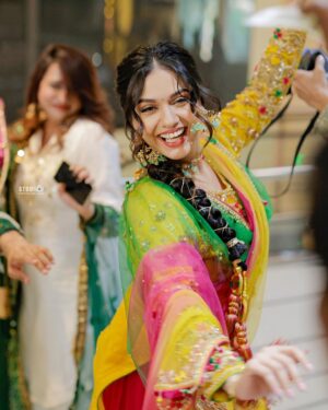 Divya Agarwal Instagram - Pinch me, I must be dreaming! Punjab ka Pind came alive for my Mehndi! ✨ Every shade, every step, every laugh - etched in henna and forever in my heart.

Outfit: @asbaabofficial
Accessories: @aulerthofficial 
Makeup: @dishisanghvii 
Hair : @hair_by_neetagohel
Assisted by @sarahsayedd16 
Mehendi: @mehendiartist_kanchanmahato 
Styled by: @sohail__mughal___ 
Wedding Planner: @audiciousentertainment 
Wedding Photography: @studiophotopalace 
Decor: @happyy_hours
Location: @be.at.one.official