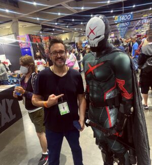 Dominique Barrett Instagram - Red X comes to #SDCC ❌ walking around as Red X was so fun 🎬 I had a couple fades to run. I even met the writer of Teen titans Academy @ilovetimsheridan & we even got to talk about my red x film I’m creating 🥂🔥 10/10 experience !! Also if you took a picture of my Red X DM ME THE PHOTO.. or else 🥷🏾

Suit by: @jcurtis_atelier 
Helmet by: @godofprops 
Suit accessories by: @chadhatter