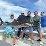 Donald Trump Jr. Instagram - Solid Morning!!!! @rbordelon’s first sailfish!!! Quick catch and release. @blacktiph @chuckopenseasontv @fieldethos @fieldethoswaterman Guam