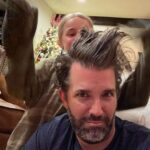 Donald Trump Jr. Instagram - Great weekend with the smurfs. Chloe was working on my newest hairstyle so I can complete my Blue Steel look once and for all. This was post about 2 dozen s’mores while watching the whole Predator series. I may need to cut out some of the sugar. LOL. Thoughts on the look??? @kimberlyguilfoyle