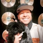 Donnie Wahlberg Instagram - Me and this little Lady (that’s also her name) hung out at the Blockhead Clubhouse tonight — aka @wahlburgersstc — and everybody was obviously more excited to see her than me. 😂🐶🐾❤️ So fun! So good to be back home and hangin’ out in “the club the BH’s built”. 🙏🏼❤️🤖❤️♾💫🍔🏡 Saint Charles, Illinois