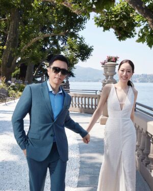 Donnie Yen Instagram - Love is beautiful, life is beautiful, wife is beautiful, I’m a big winner!😊
Thank you Cosmo Bride for this awesome cover at one of the most romantic setting. 
@sweetcil @cosmopolitan #lakecomo #weddinganniversary❤️ #20yearsmarriageanniversary
