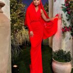Dorit Kemsley Instagram - season 13 reunion look ❤️‍🔥 #rhobh @schiaparelli dress and @balmain shoes for a monochromatic, surrealist inspired ruby red look 👠📌❤️