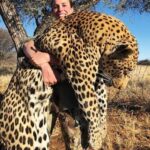 Doutzen Kroes Instagram - How can you find pride and pleasure in killing a beautiful animal like this large male Leopard. The woman in the picture should be ashamed of herself! I find this disgusting and I’m so upset, sad and angry that this still happens!! #stopbiggamehunting 😓
